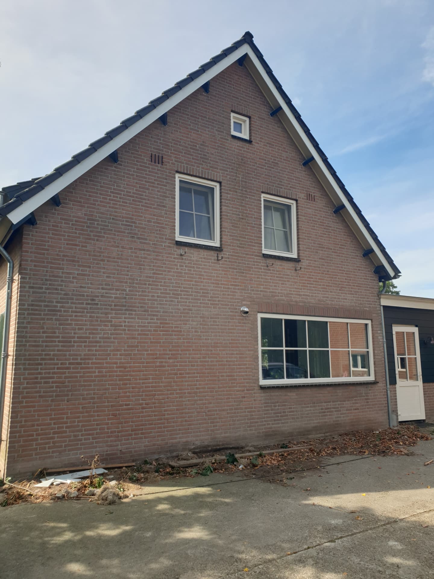 Buitenschilderwerk op hoogte foto 4