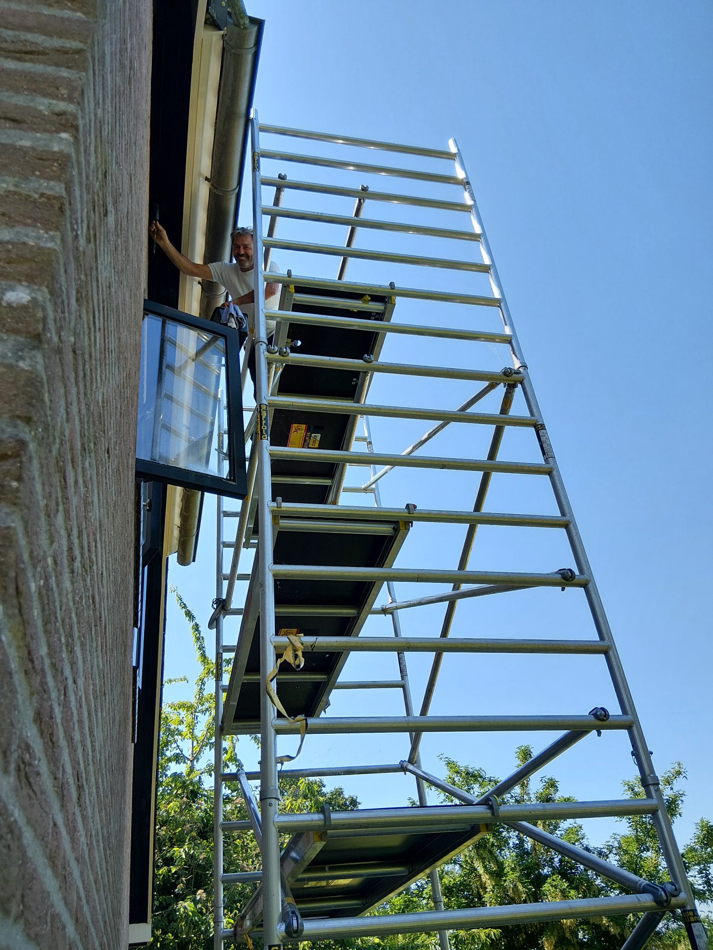 Buitenschilderwerk op hoogte foto 3