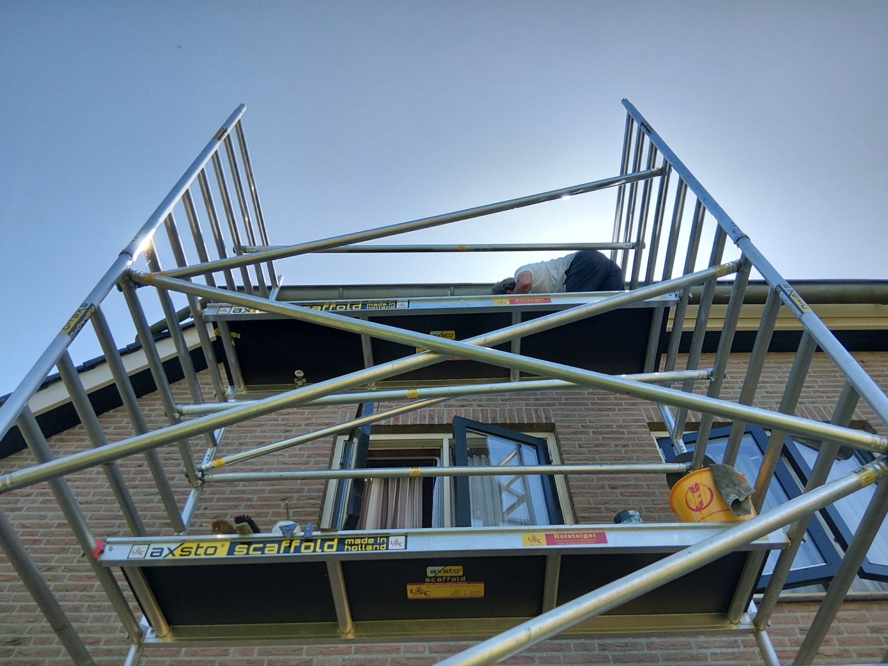 Buitenschilderwerk op hoogte foto 5